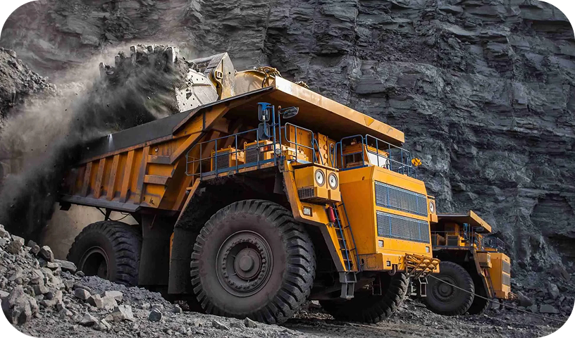 Yellow mining dump truck in a rock quarry