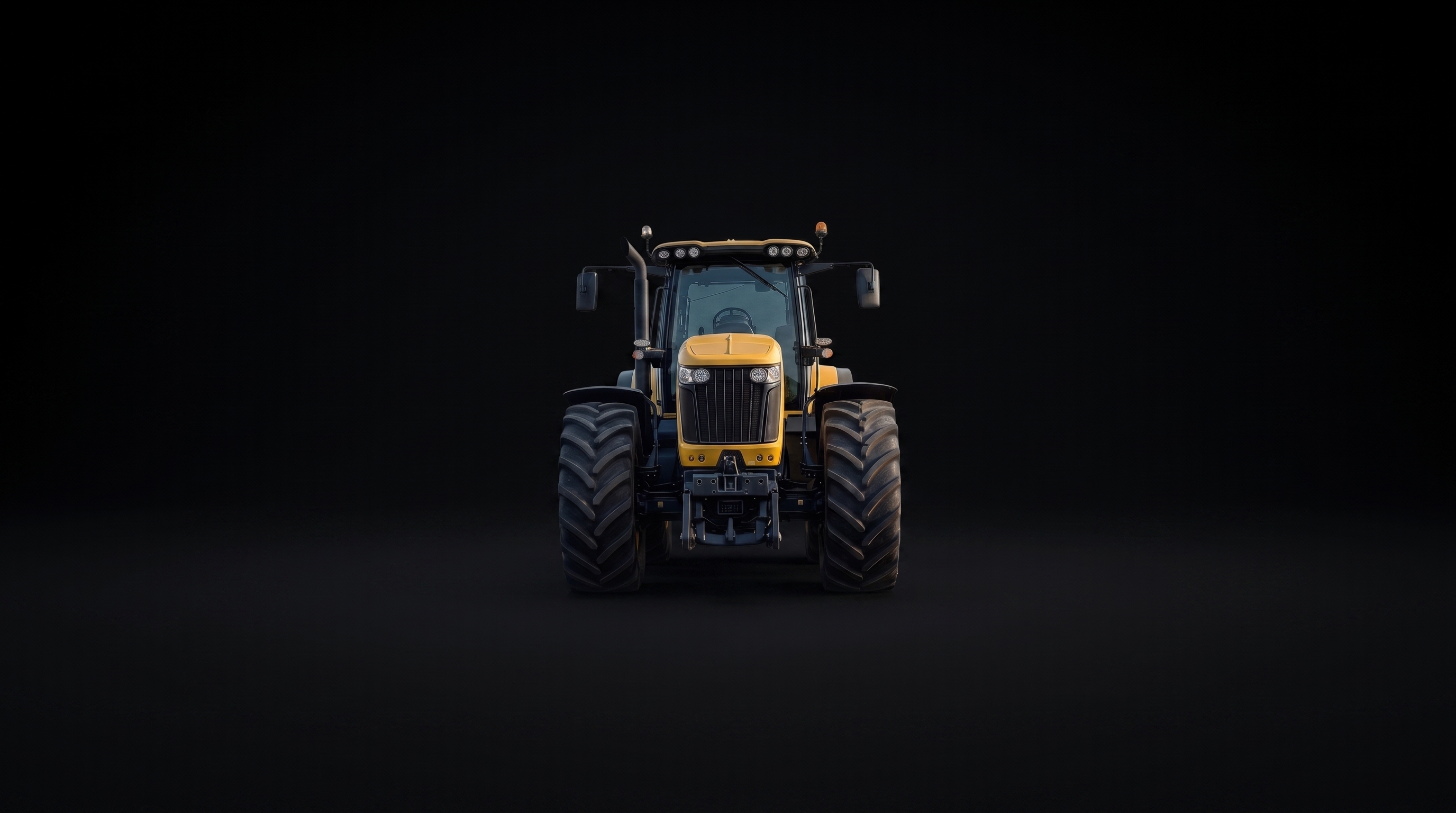 Yellow tractor, studio shot